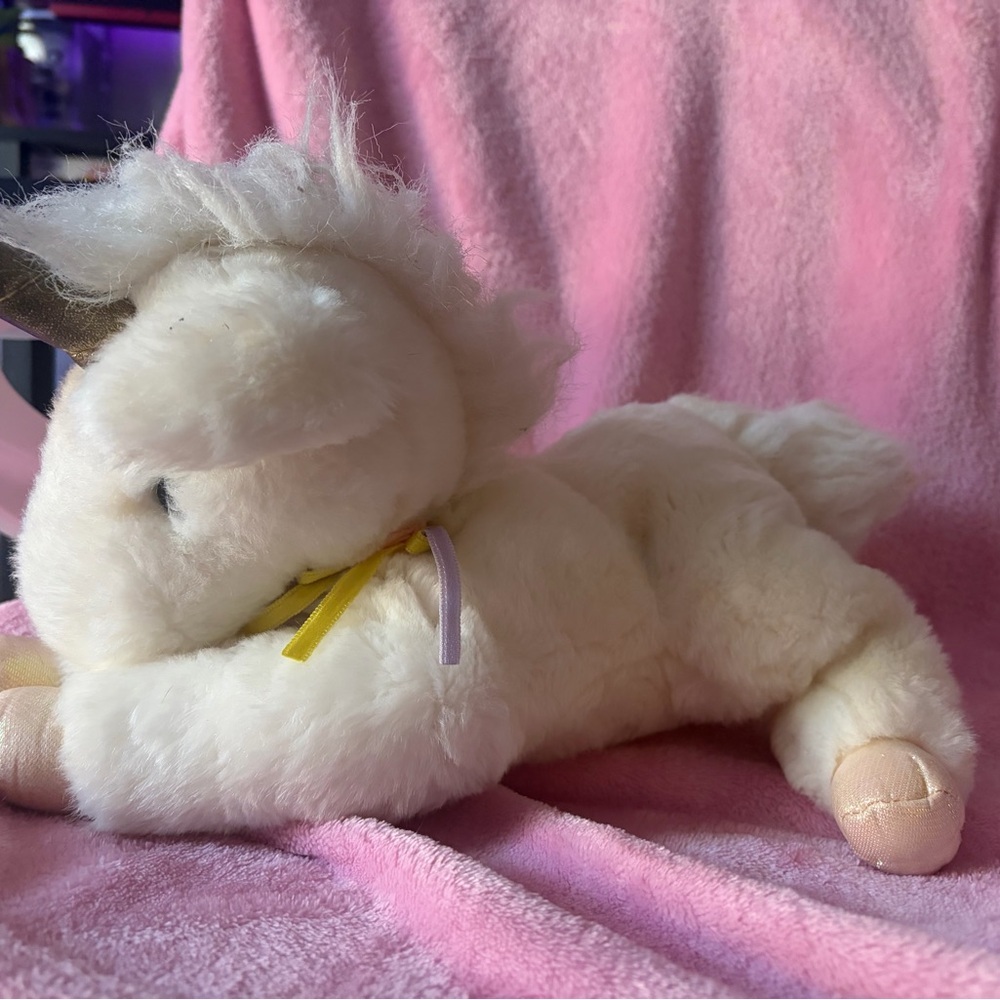 Vintage Aurora plush unicorn